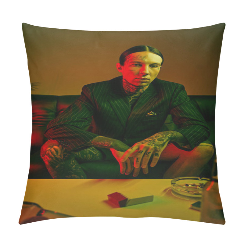 Personality  A Man With Tattoos Sitting On A Couch Pillow Covers