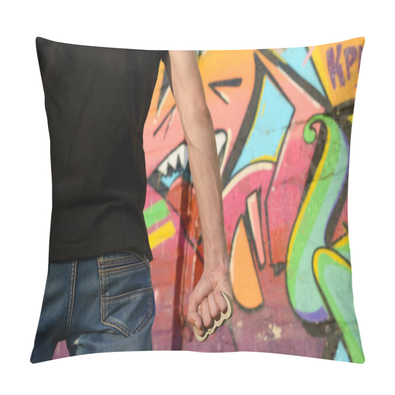 Personality  Back View Of Young Caucasian Man With Brass Cnuckle On His Hand Against Ghetto Brick Wall With Graffiti Paintings. Concept Of Criminal Forces And Aggression Charge. Classic Gangsters Melee Weapon Pillow Covers