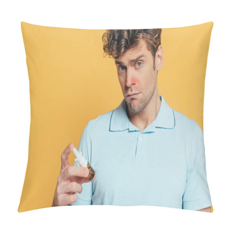 Personality  Sick Man Holding Bottle Of Nasal Drops And Looking At Camera Isolated On Yellow Pillow Covers