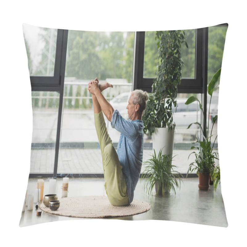 Personality  Grey Haired Man Doing Boat Yoga Pose Near Tibetan Singing Bowls And Incense Stick In Yoga Studio  Pillow Covers