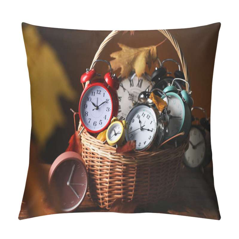 Personality  Alarm Clocks And Dry Leaves In Wicker Basket On Wooden Table Against Brown Background Pillow Covers