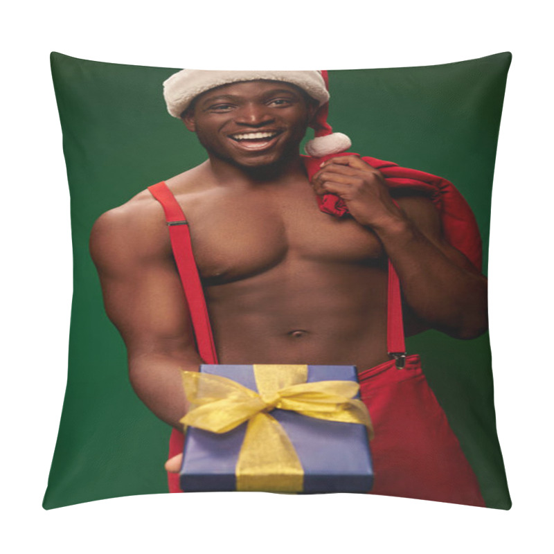 Personality  Joyful Shirtless African American Man In Santa Hat With Christmas Bag Showing Gift Box On Green Pillow Covers