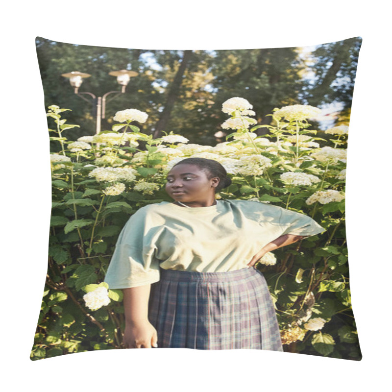 Personality  A Plus-size African American Woman Stands Confidently In Front Of A Bush With White Flowers, Embracing The Beauty Of Nature Around Her. Pillow Covers