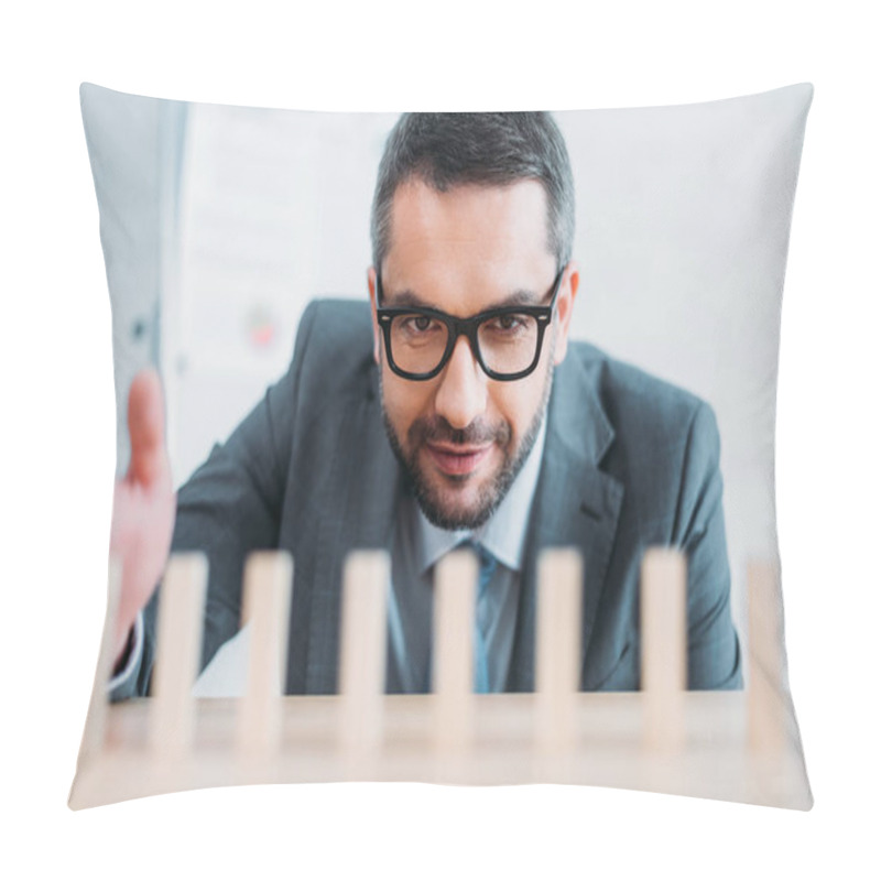 Personality  Close-up Shot Of Businessman Assembling Wooden Blocks In Row On Worktable, Dominoes Effect Concept Pillow Covers