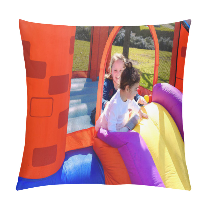 Personality  Inflatable Castle Outdoor At Sunny Summer Day.Two Little Happy Girls Playing And Jumping Down The Slide On An Inflatable Bouncy Castle. Pillow Covers