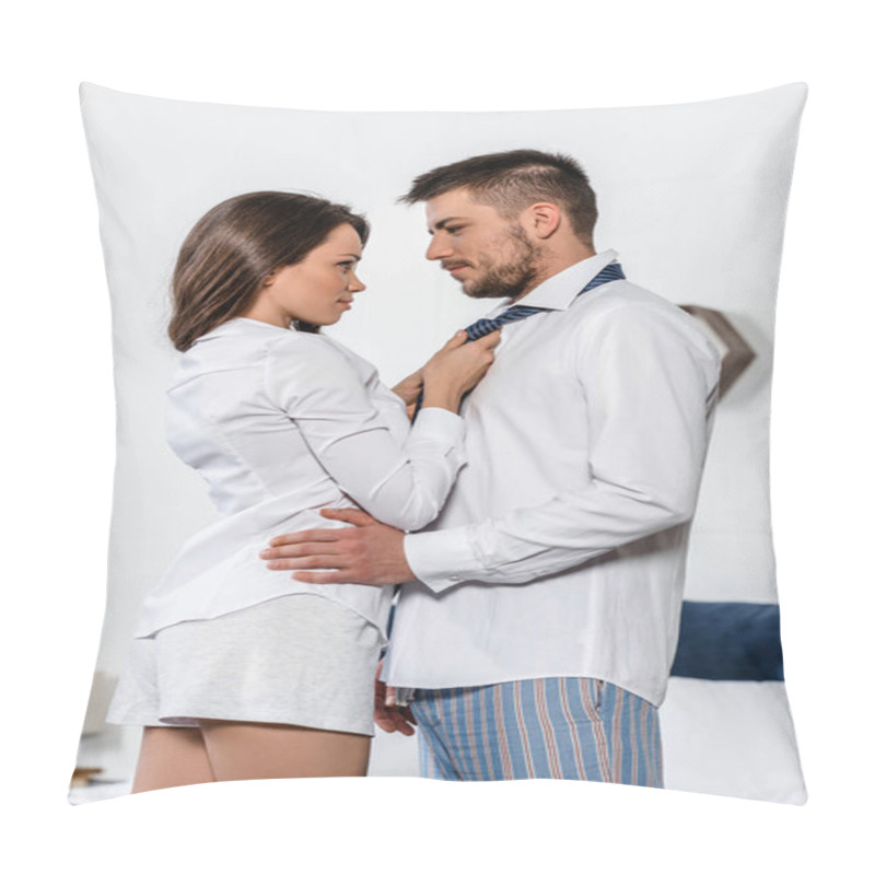 Personality  Low Angle View Of Girlfriend Tying Boyfriend Tie In Morning On Weekday In Bedroom, Social Role Concept Pillow Covers