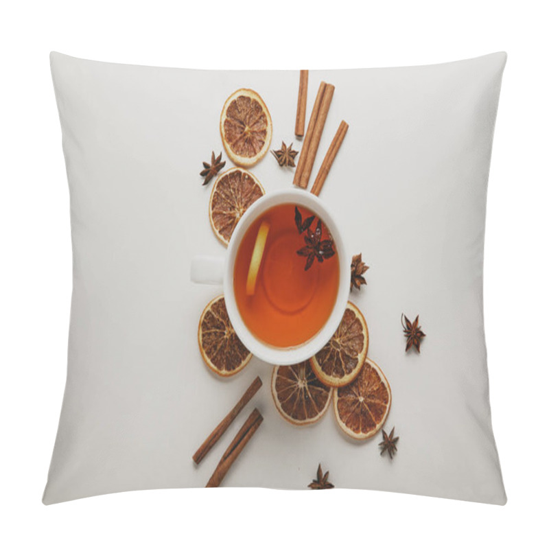 Personality  Flat Lay With Arranged Cinnamon Sticks, Anise Stars, Dried Orange Pieces And Cup Of Hot Tea On White Background Pillow Covers