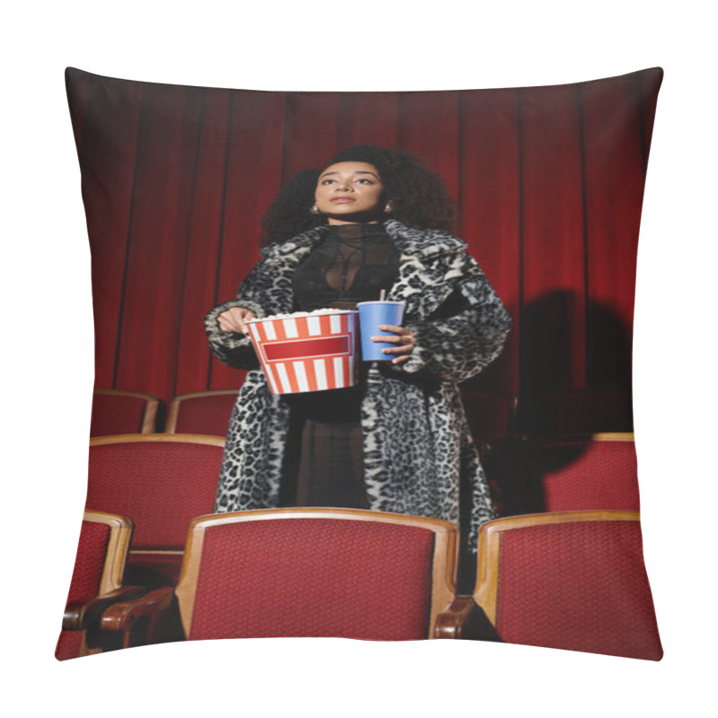 Personality  Stylish African American Woman In Leopard-print Reacts To Movie In Dark Cinema, Holding Popcorn And A Drink. Pillow Covers