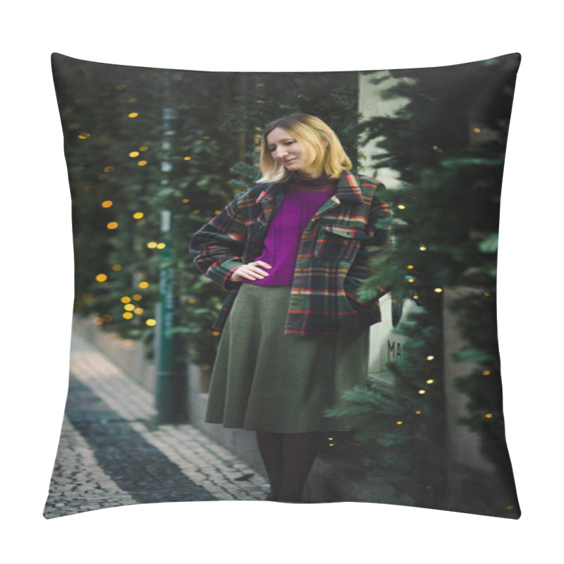 Personality  A Full-length Woman In A Checkered Jacket Standing On A Cobblestone Street, With Festive Fir Branches And Twinkling Lights Around Her, Creating A Warm Holiday Ambiance. Pillow Covers