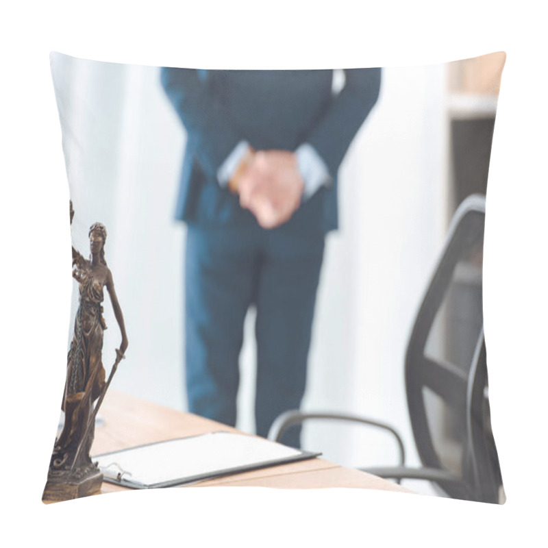 Personality  Close-up View Of Lady Justice Statue And Clipboard On Table And Lawyer Standing Behind  Pillow Covers