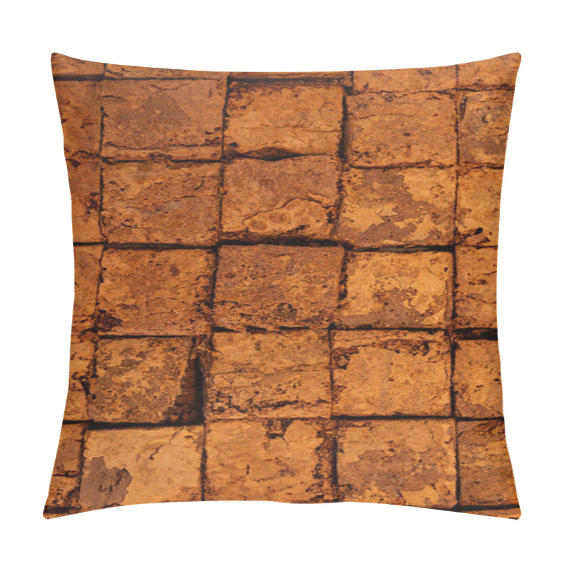 Personality  Decorative Arrangement Of Rustic Brown Tiles Displayed On A Textured Surface In A Warm-lit Environment Pillow Covers