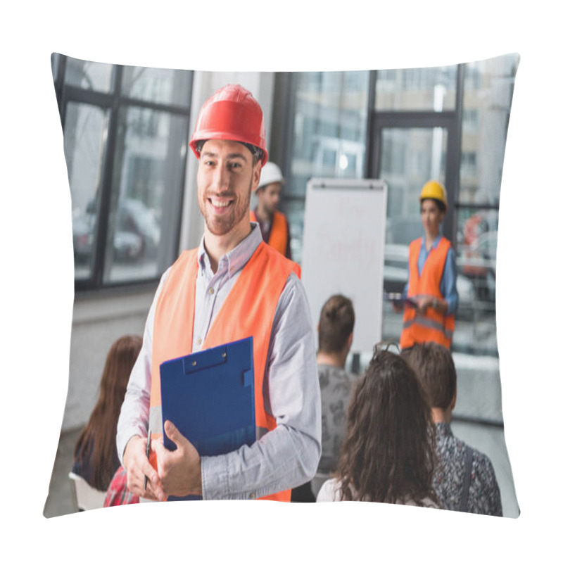 Personality  Cheerful Fireman Holding Clipboard Near Coworkers Giving Talk On Briefing Pillow Covers