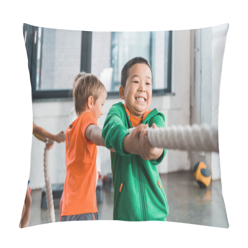 Personality  Selective Focus Of Multicultural Kids Playing Tug Of War In Gym Pillow Covers