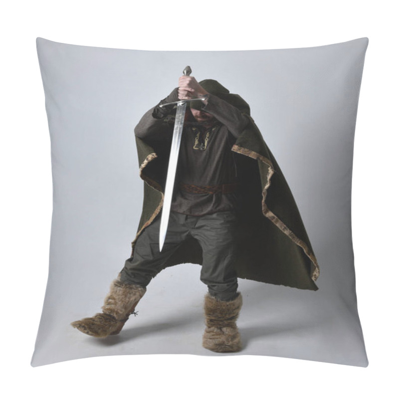 Personality  Full Length  Portrait Of  Young Handsome Man  Wearing  Medieval Celtic Adventurer Costume With Hooded Cloak, Holding Sword, Isolated On Studio Background. Pillow Covers