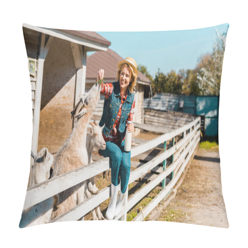 Personality  Attractive Woman With Milk Bottle Sitting On Wooden Fence And Feeding Goats By Grass At Farm Pillow Covers