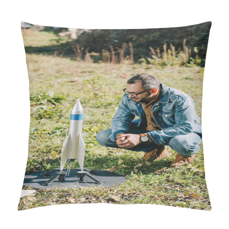 Personality  Handsome Man In Eyeglasses Looking At Model Rocket Outdoor Pillow Covers