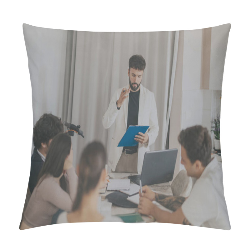 Personality  A Young Man Leads A Team Meeting In A Home Office Setting, Discussing Plans And Strategies. The Colleagues Are Attentive And Engaged, Highlighting A Collaborative And Productive Environment. Pillow Covers