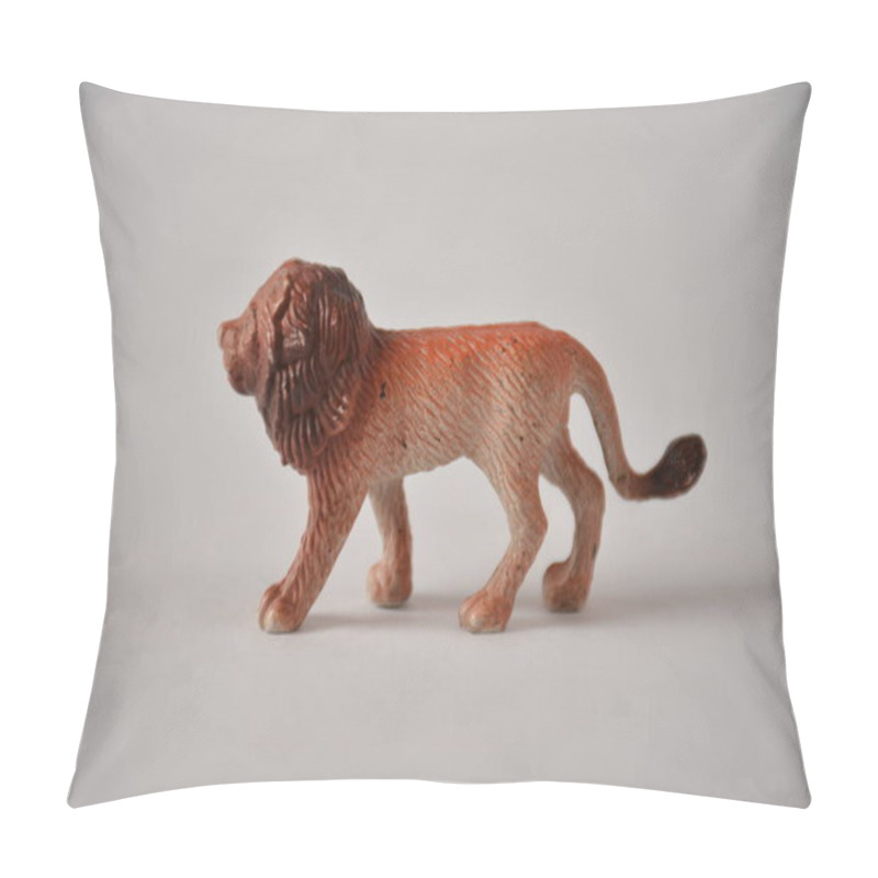 Personality  A Small, Detailed Lion Figurine On A Plain Background. Pillow Covers