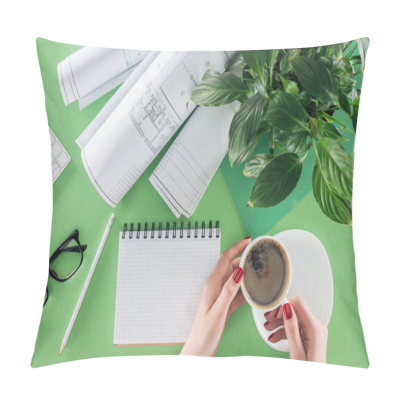 Personality  Cropped Image Of Female Architect Holding Cup Of Coffee At Table With Textbook, Blueprints And Plant  Pillow Covers