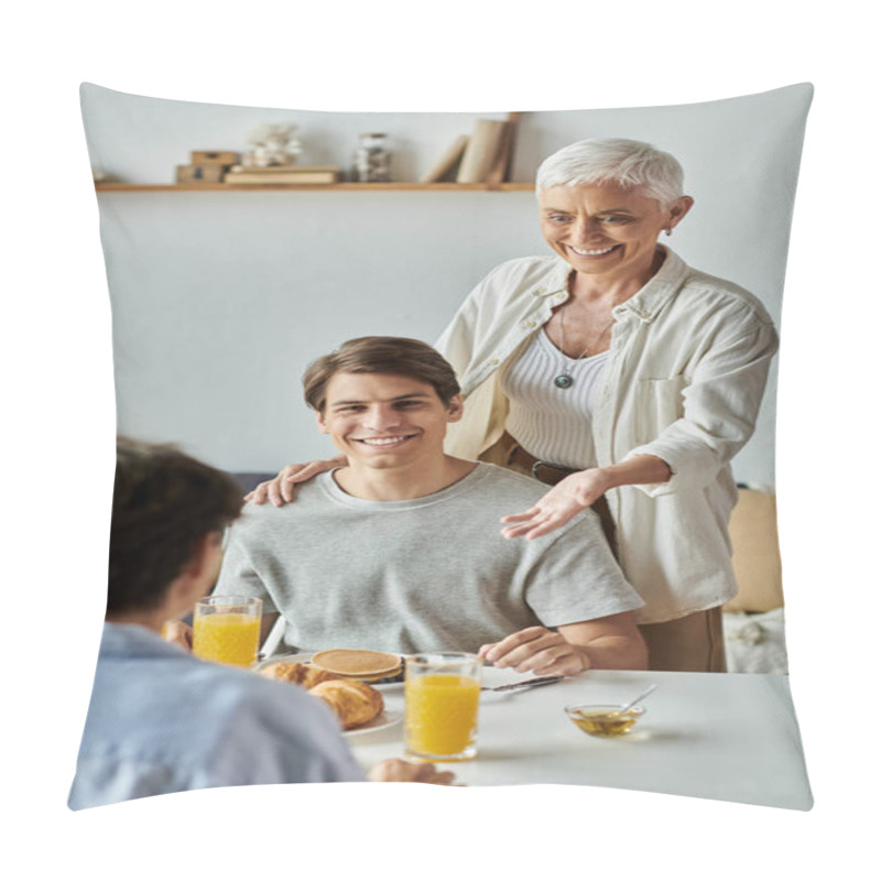 Personality  Lesbian Parents And Their Adult Son Share Laughter And Love Over Breakfast In A Sunny Kitchen. Pillow Covers