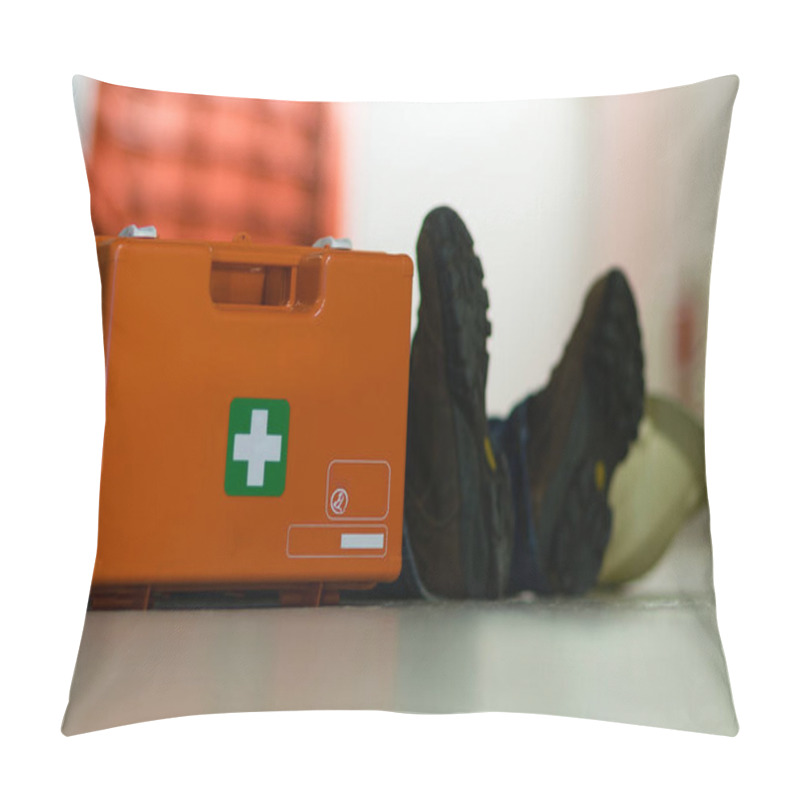 Personality  First Aid After An Accident At Work. First Aid Kit And Helmet Near Worker. Pillow Covers