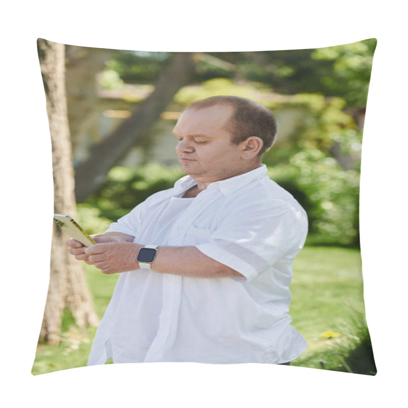 Personality  A Man With Inclusivity In A White Shirt Uses His Phone While Walking Through A Park On A Sunny Day. Pillow Covers