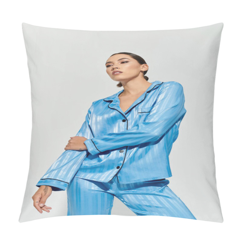 Personality  A Beautiful Young Woman Showcases Her Elegance In Chic Blue Pajamas While Posing Gracefully. Pillow Covers