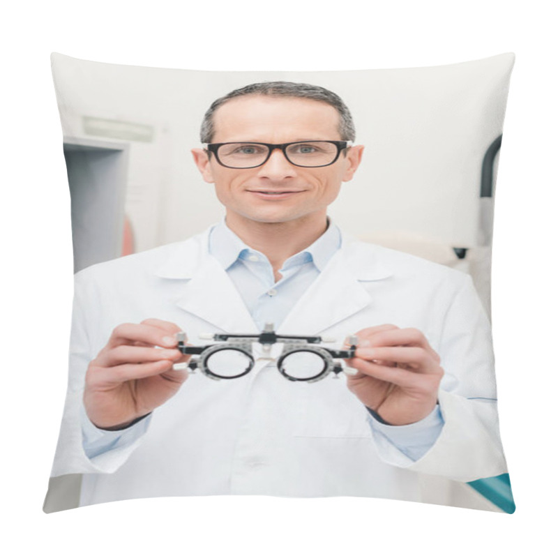 Personality  Portrait Of Optometrist In White Coat Holding Trial Frame In Hands In Clinic Pillow Covers