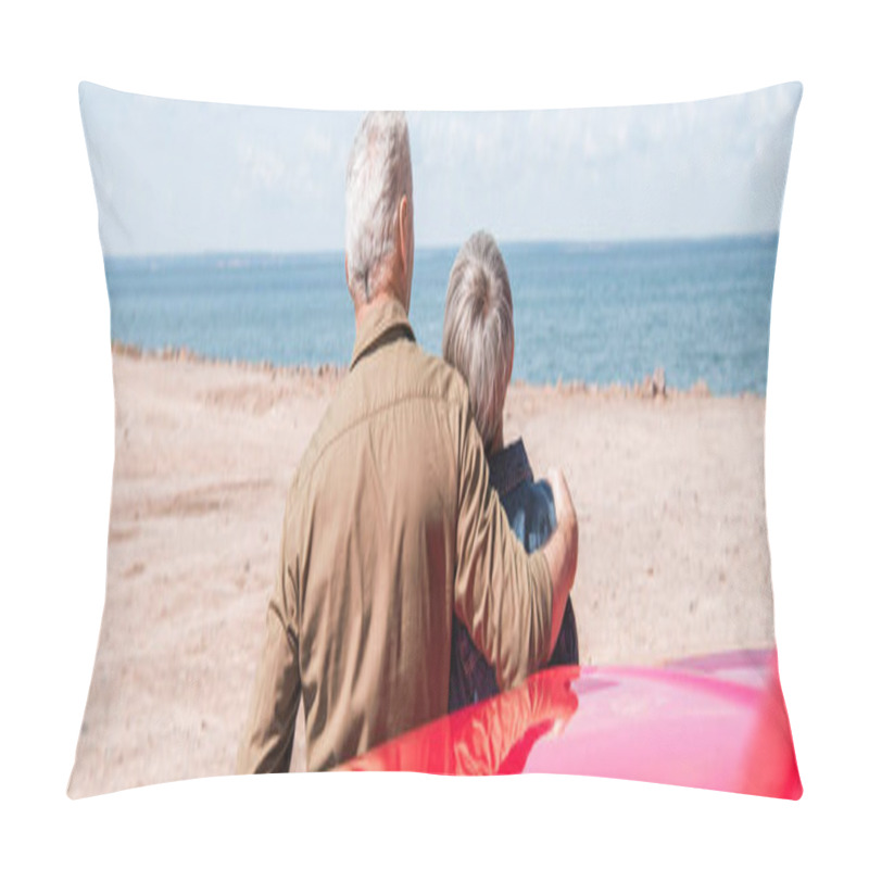 Personality  Panoramic View Of Senior Couple Of Tourists Standing Near Car And Embracing At Beach Pillow Covers