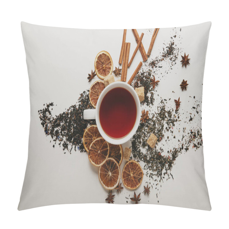 Personality  Flat Lay With Arranged Cinnamon Sticks, Anise Stars, Brown Sugar, Dried Orange Pieces And Cup Of Hot Tea On White Background Pillow Covers