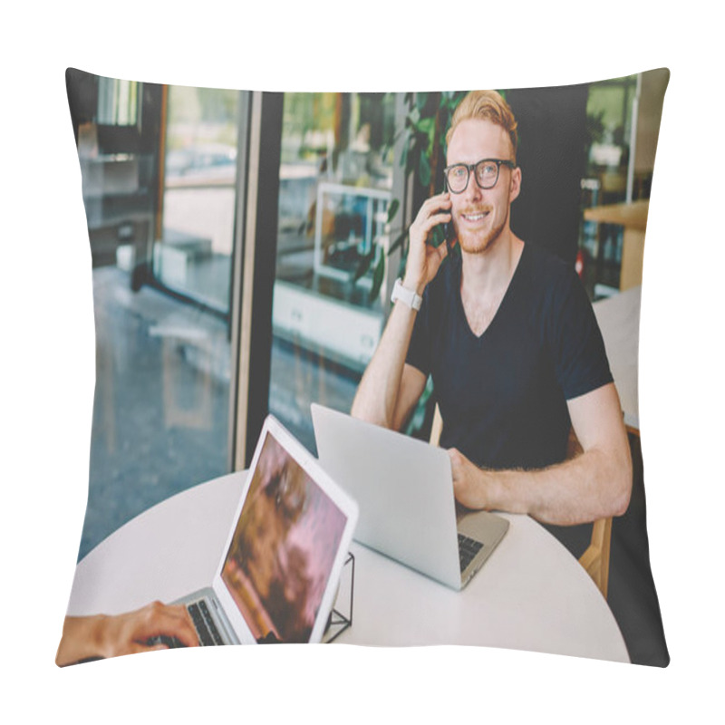 Personality  Portrait Of Happy Software Developer Making Cellphone Conversation For Discussing Wireless Connection In Coworking, Programmer In Eyewear Smiling During Remote Work With Cropped Female Colleague Pillow Covers