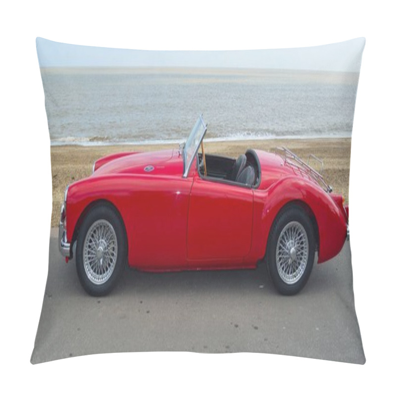 Personality  FELIXSTOWE, SUFFOLK, ENGLAND -  MAY 07, 2017: Classic  Red  MGA  Car  Parked On Seafront Promenade With Sea In Background. Pillow Covers