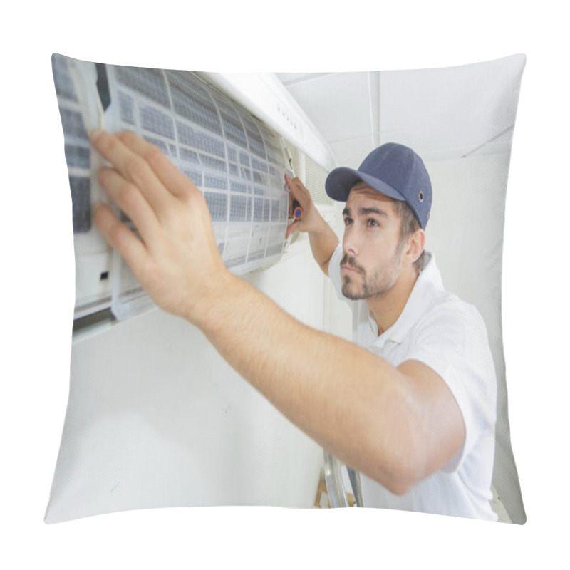 Personality  Portrait Of Mid-adult Male Technician Repairing Air Conditioner Pillow Covers