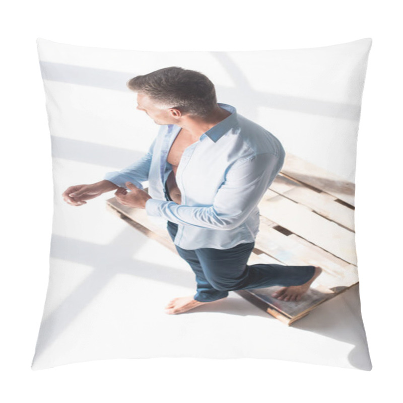 Personality  High Angle View Of Handsome Adult Man Buttoning Shirt On White Pillow Covers