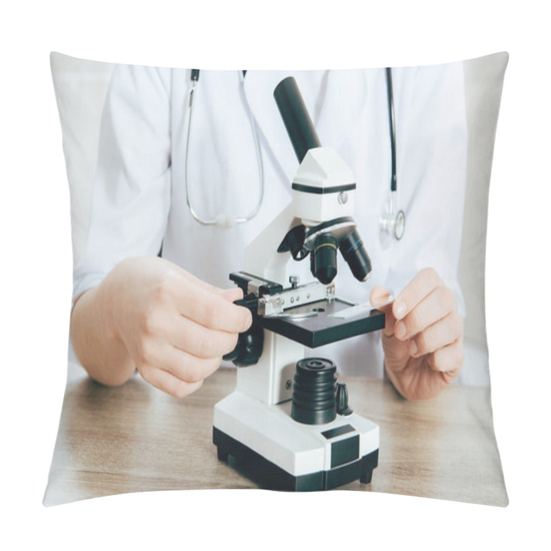 Personality  Cropped View Of Doctor In White Coat With Stethoscope Using Microscope Pillow Covers