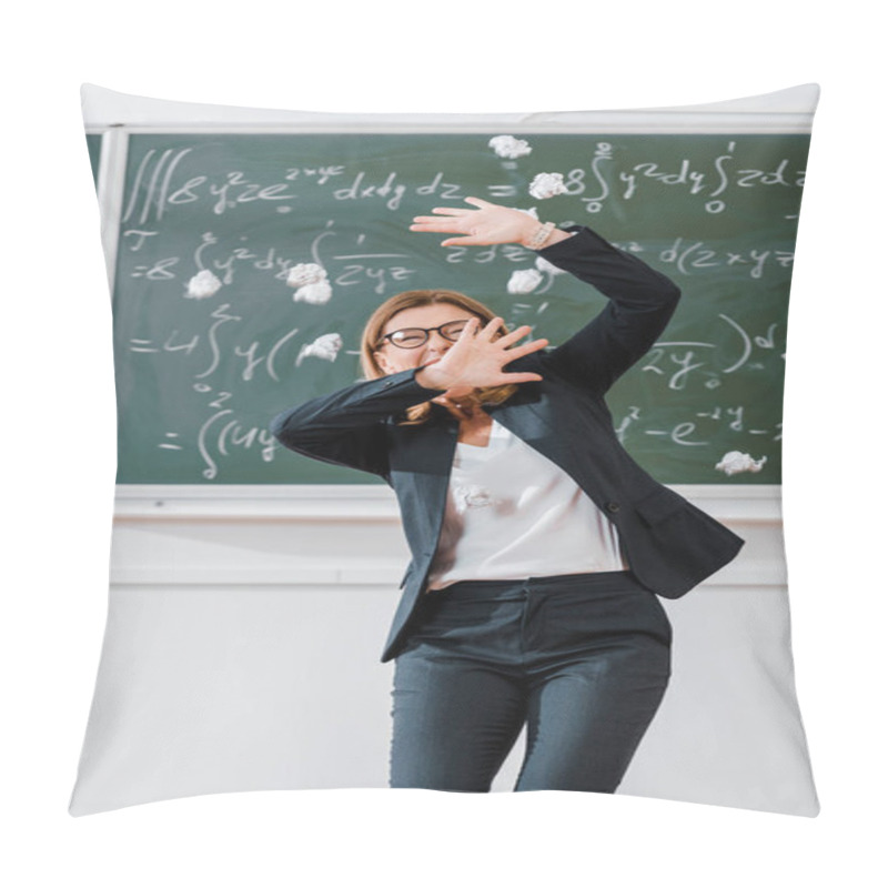 Personality  Crumpled Paper Balls Flying At Frightened Female Teacher In Classroom With Chalkboard On Background Pillow Covers