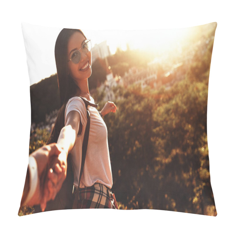 Personality  Happy Young Woman Looking At Camera And Smiling While Holding Hands With Her Boyfriend Outdoors Pillow Covers