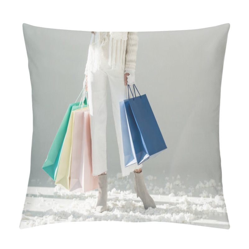 Personality  Cropped Image Of Woman In Fashionable Winter Sweater And Scarf Standing With Shopping Bags On White Pillow Covers