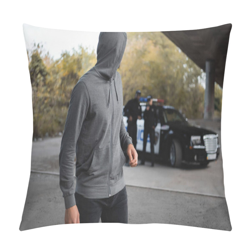 Personality  Hooded Thief Looking Away With Blurred Multicultural Police Officers On Background Outdoors Pillow Covers