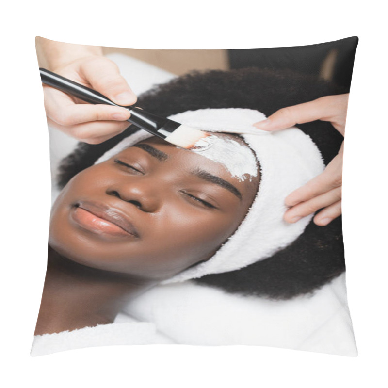 Personality  Spa Therapist Applying Face Mask With Cosmetic Brush On Forehead Of African American Woman In Spa Salon Pillow Covers