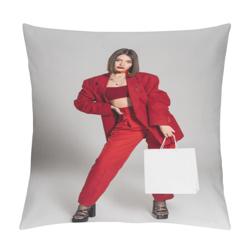 Personality  Red Suit, Stylish Posing, Tattooed Young Woman With Brunette Short Hair And Nose Piercing Holding Shopping Bags And Standing On Grey Background, Youth Culture, Fashionable Outfit, Consumerism  Pillow Covers