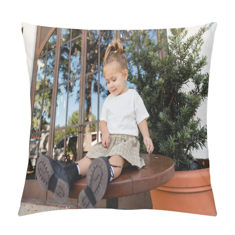 Personality  Full Length Of Smiling Toddler Girl In Skirt And White T-shirt Sitting On Bistro Table Near Outdoor Cafe In Miami  Pillow Covers