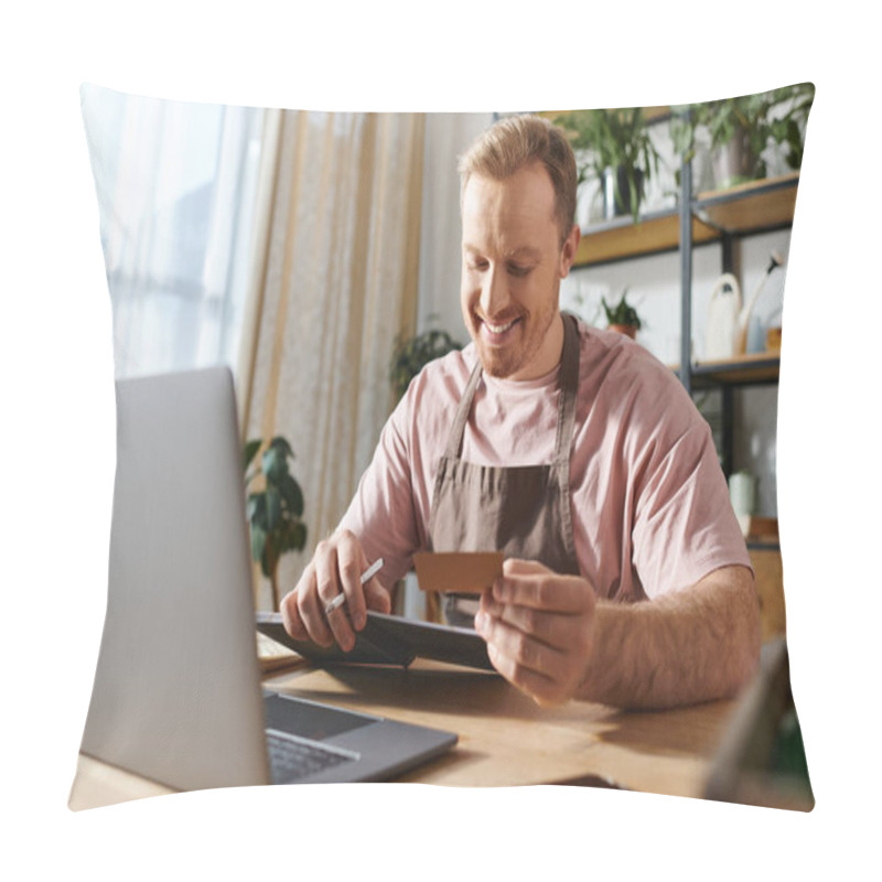 Personality  A Man Sitting At A Laptop Computer, Holding A Credit Card, Likely Purchasing Supplies For His Small Plant Shop Business. Pillow Covers