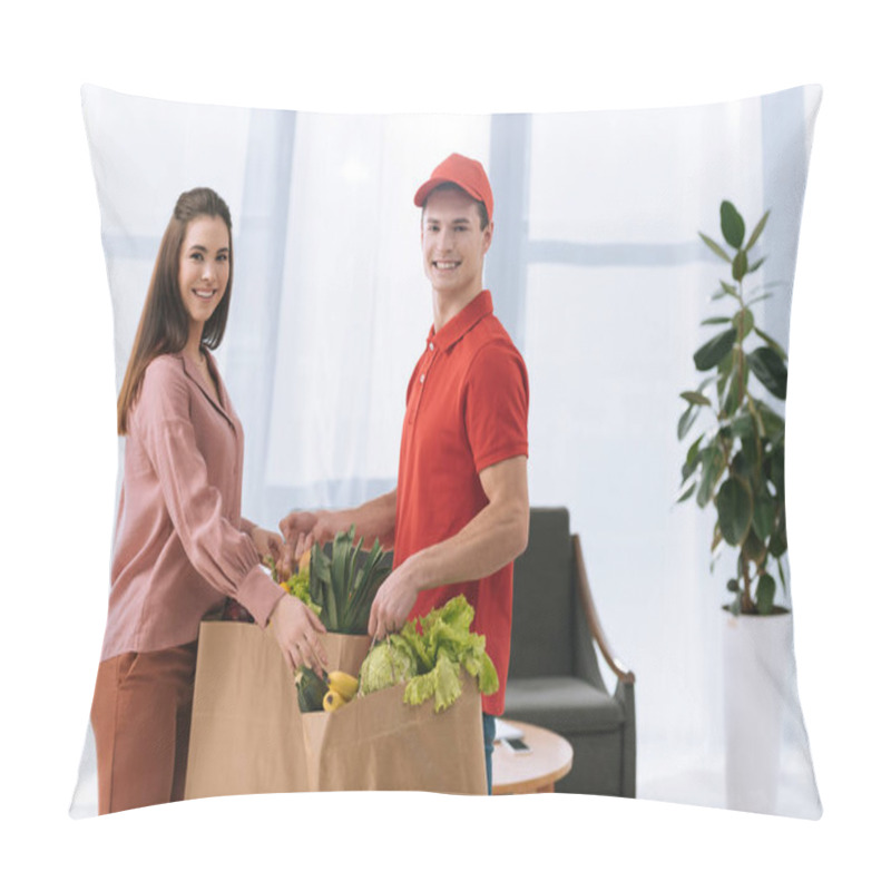 Personality  Side View Of Courier Smiling At Camera And Giving Packages With Fresh Vegetables To Attractive Woman  Pillow Covers