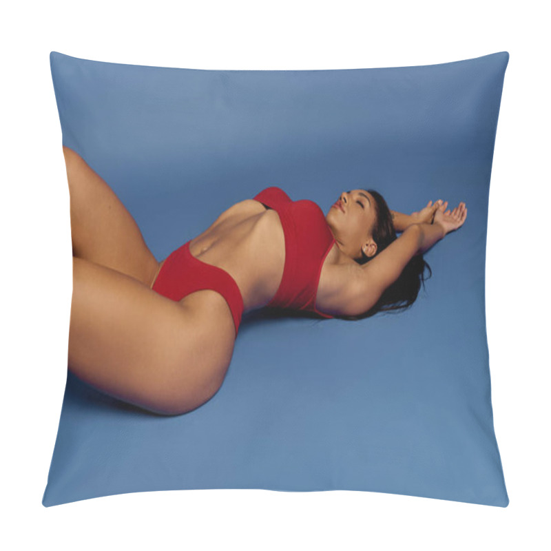 Personality  A Beautiful Young Woman Poses Confidently In Red Lingerie Against A Blue Backdrop. Pillow Covers