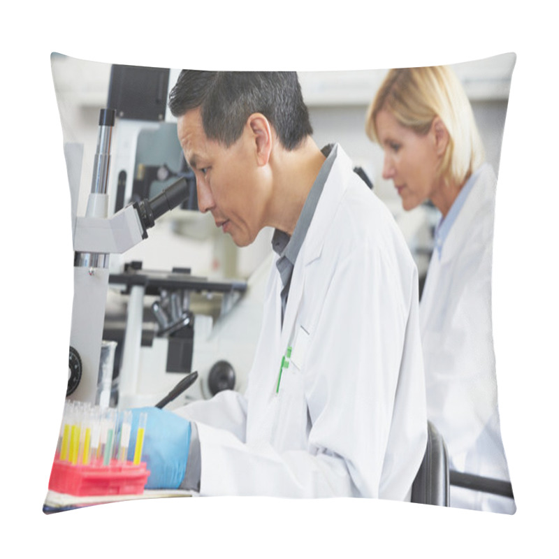 Personality  Male And Female Scientists Using Microscopes In Laboratory Pillow Covers