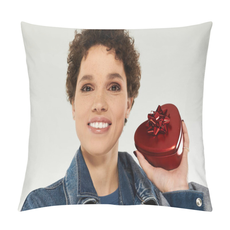 Personality  Young Woman With Cheerful Expression Presents A Vibrant Heart Shaped Gift, Showcasing Her Style. Pillow Covers