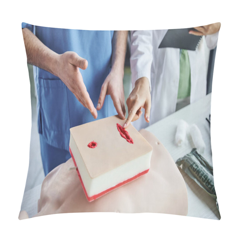 Personality  Medical Seminar, Partial View Of Professional Healthcare Worker And Student Pointing At Wound Care Simulator Near CPR Manikin And Bandages, First Aid And Emergency Preparedness Concept Pillow Covers