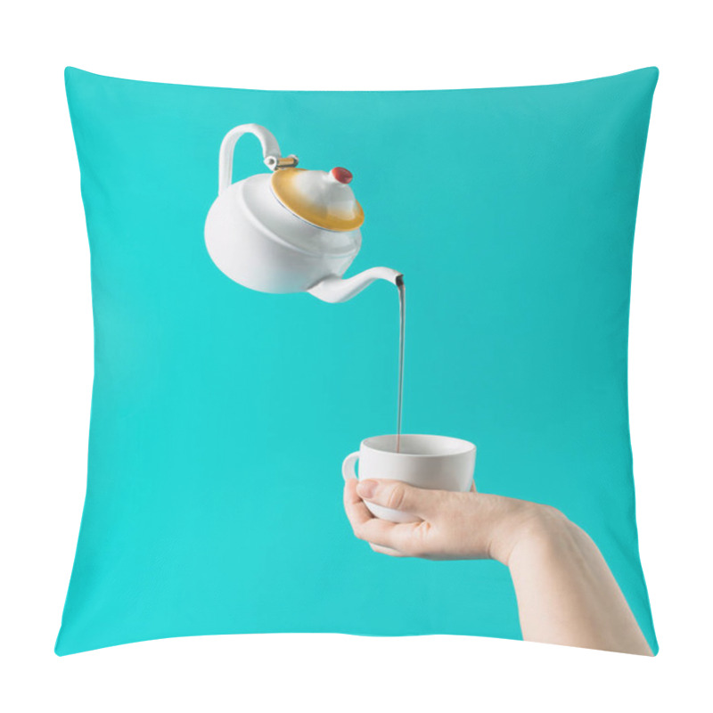 Personality  A White Teapot Pours Tea Into A Cup That Is In His Hand On A Turquoise Blue Background. Minimal Layout Composition. Pillow Covers