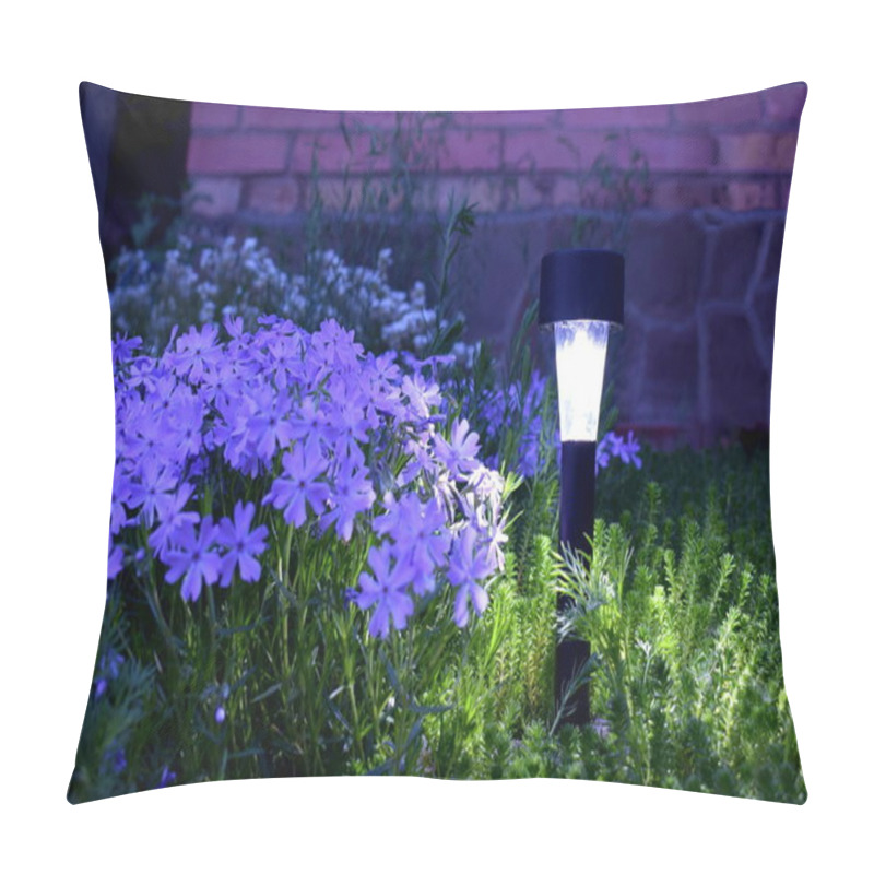 Personality  A Solar-powered Lamp Illuminates Flowers In The Garden At Night. Pillow Covers